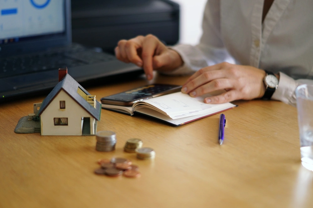 closeup-shot-person-thinking-buying-selling-house_1000x667