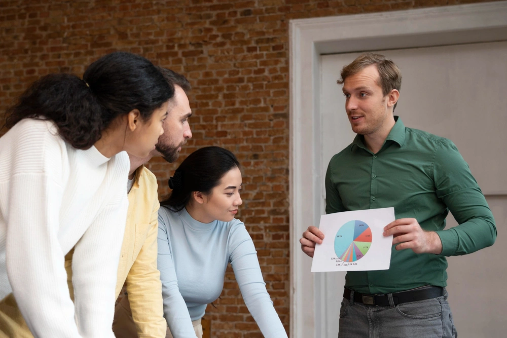 corporate-workers-brainstorming-together_1000x667